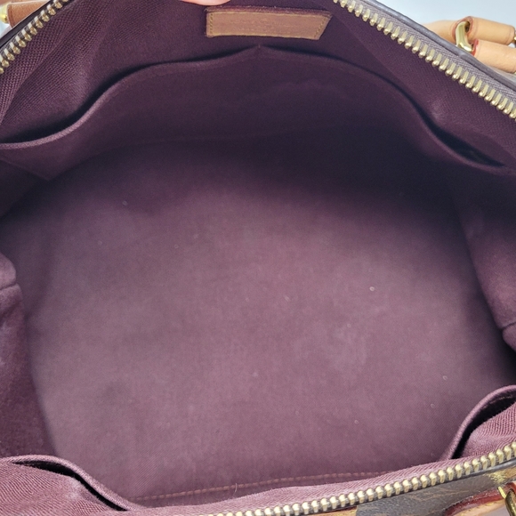 LOUIS VUITTON RIVOLI PM - Picture 10 of 15